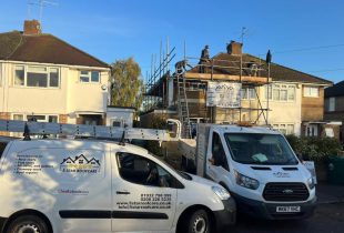 5 Star Roofcare - vans outside a residential house carrying out roof repairs