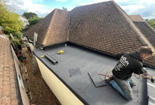 5 Star Roofcare - carrying out roof repairs on an extensions flat roof
