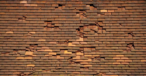 damaged and falling roof tiles